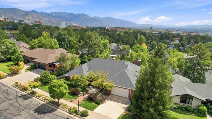 Prime Federal Heights location with a mountain backdrop and a city skyline.