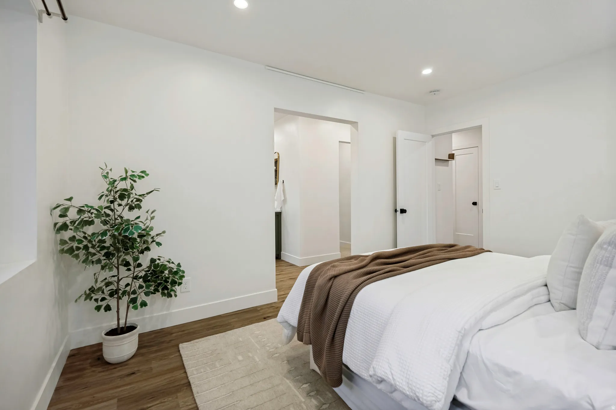 Wood-finish flooring with white walls