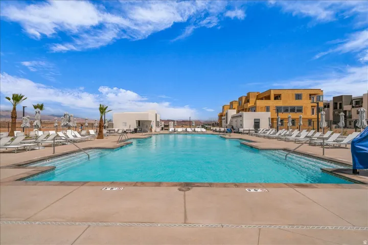 Resort-style pool with integrated steps and surrounding hardscaping