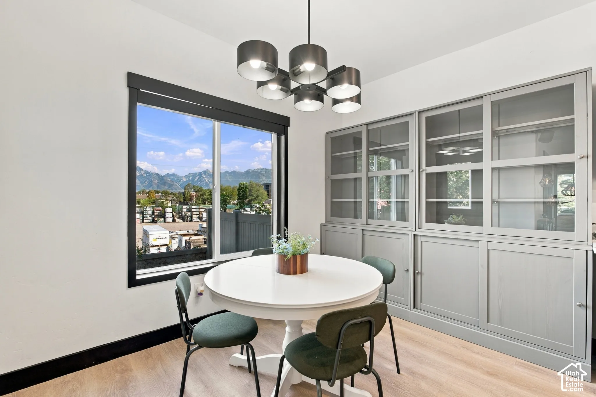 Wood-finish flooring with a contrasting baseboard