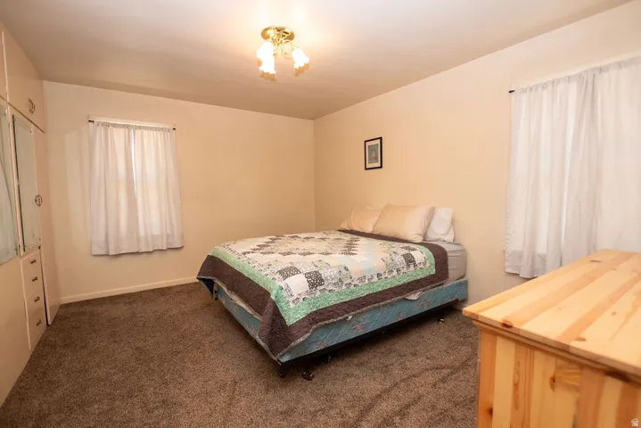 Neutral-toned walls with carpeted flooring