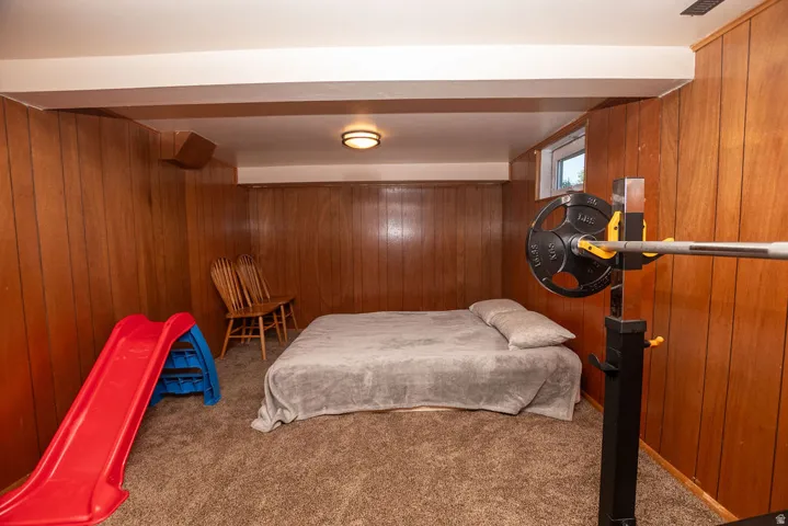 Panel wall detailing and carpeted flooring