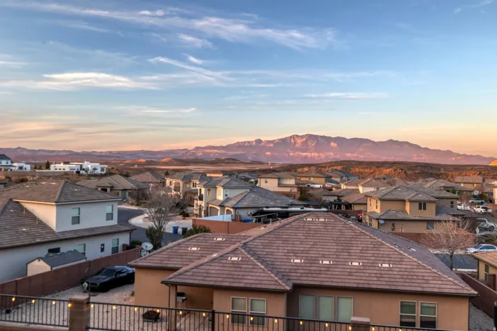 Expansive mountain backdrop with a wide-ranging residential community