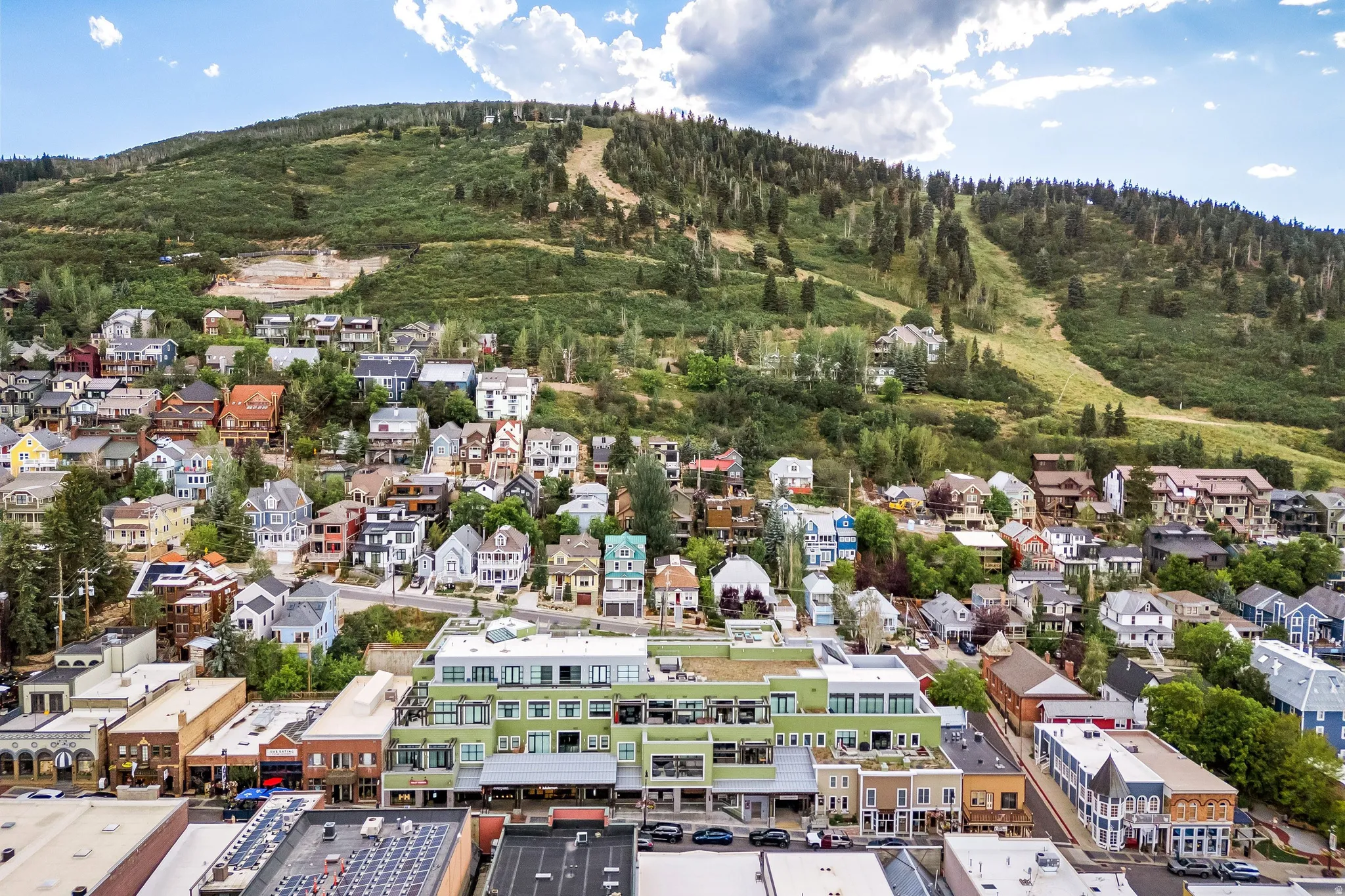 Mountain landscape with a community of varied residential and commercial buildings