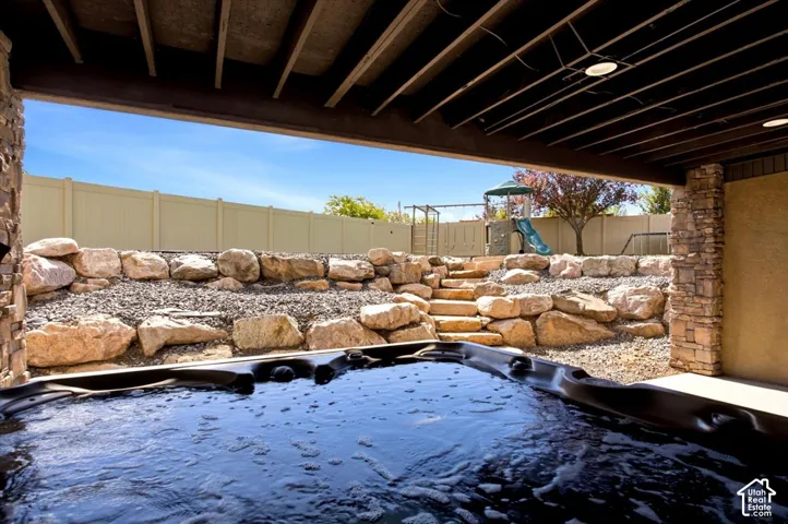 Hot tub on patio off of basment entrance