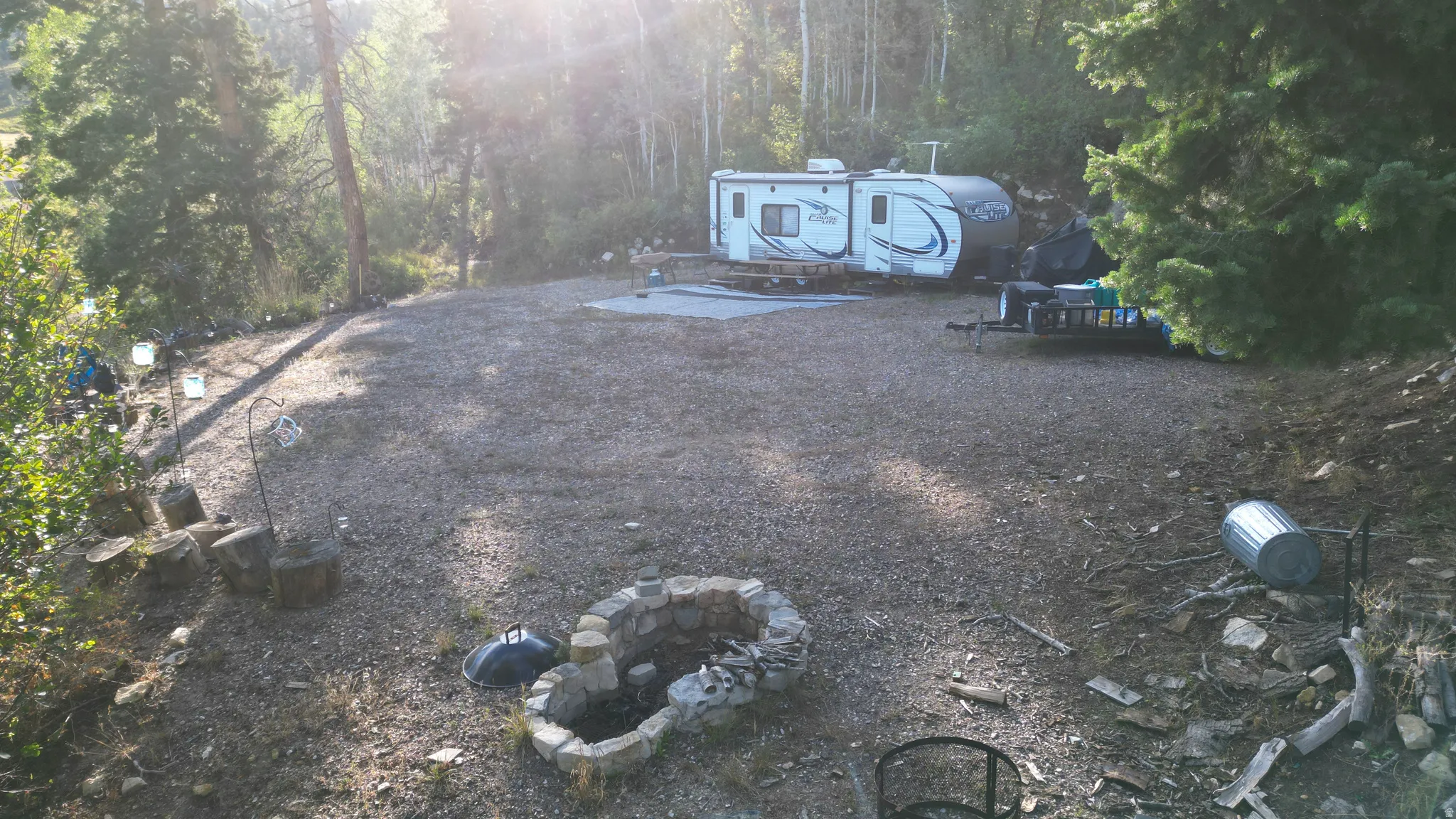 Gravel ground cover with a stone fire pit