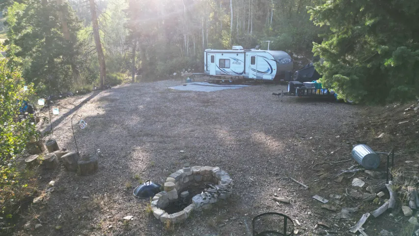 Gravel ground cover with a stone fire pit