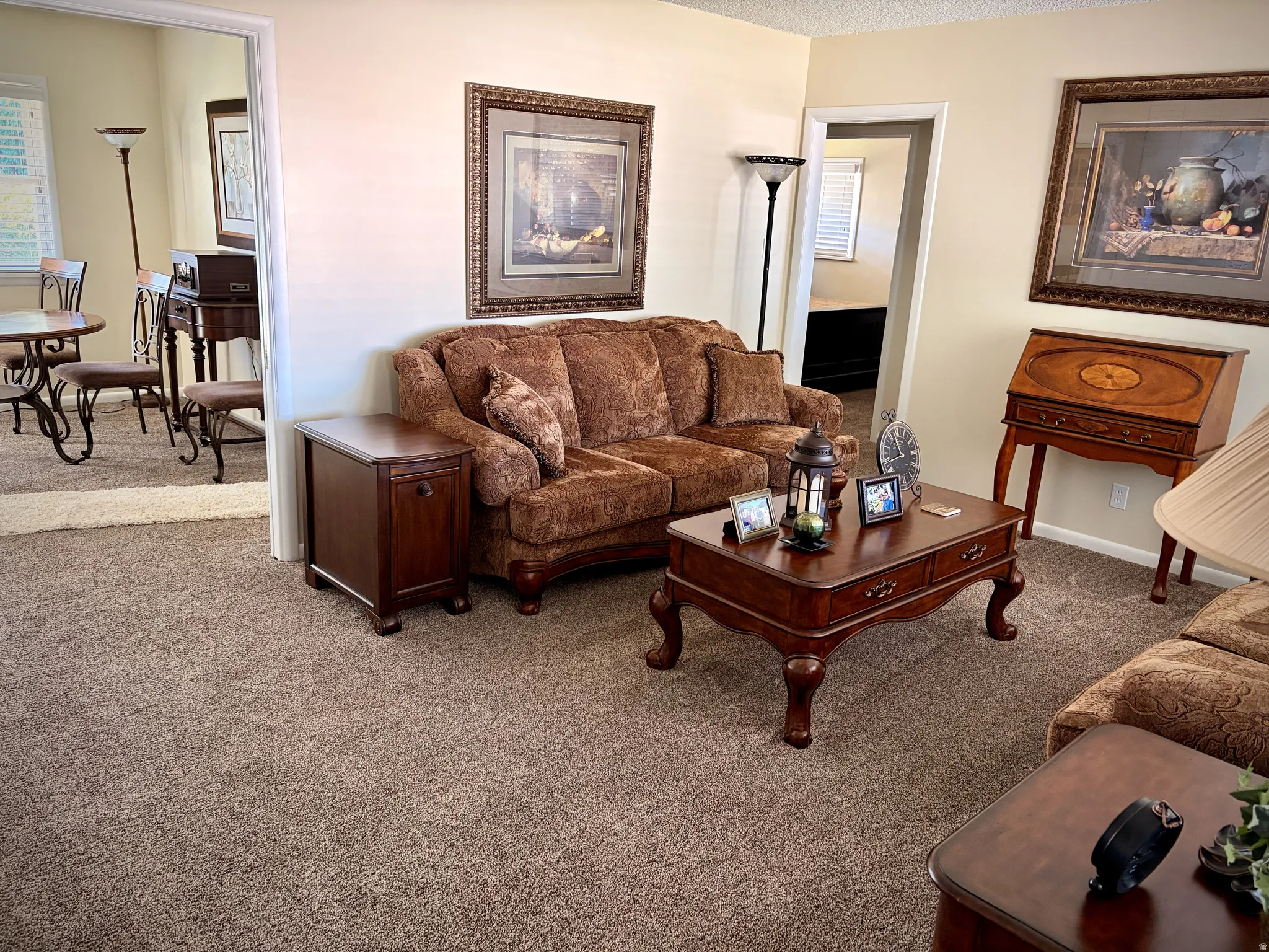 Living Room with entry into dining area and bedrooms