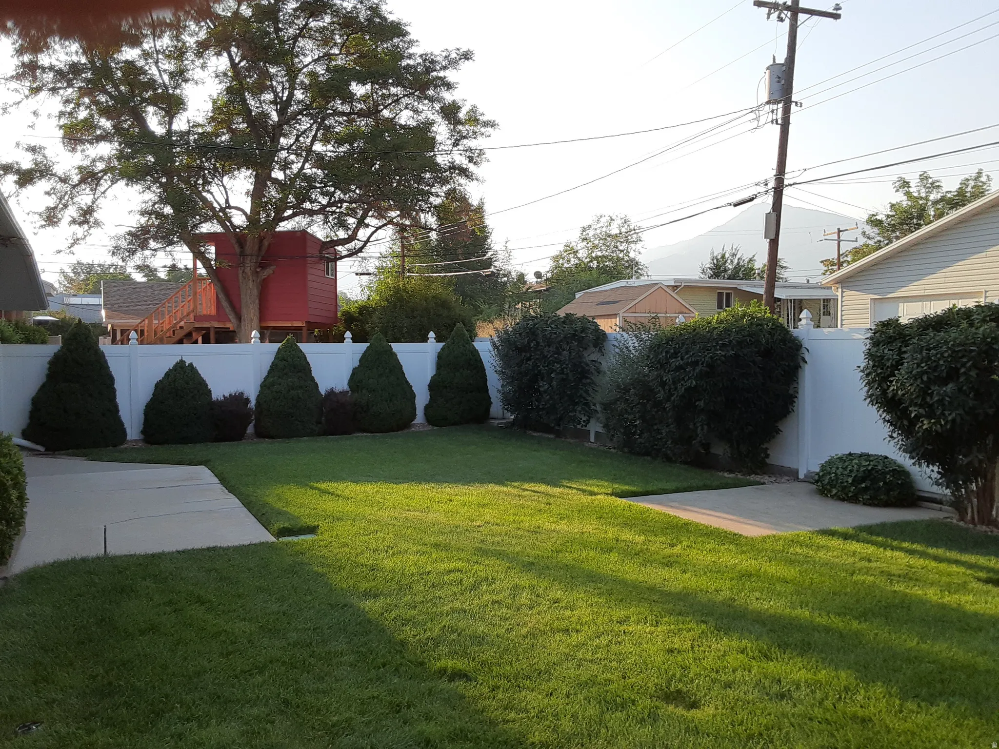 Backyard - showing fenced backyard and beautiful landscaping