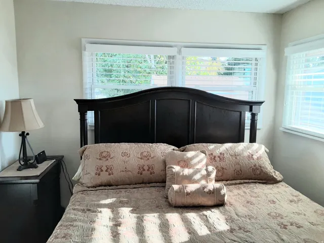 Bed 1 - Primary - Fits a King bed (pictured) and has 2 closets.