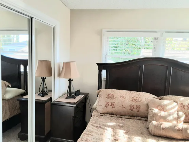 Bed 1 - Primary (2) Fits King bed (pictured) with mirrored door closet