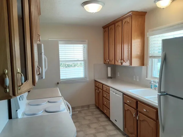 Kitchen with white appliances