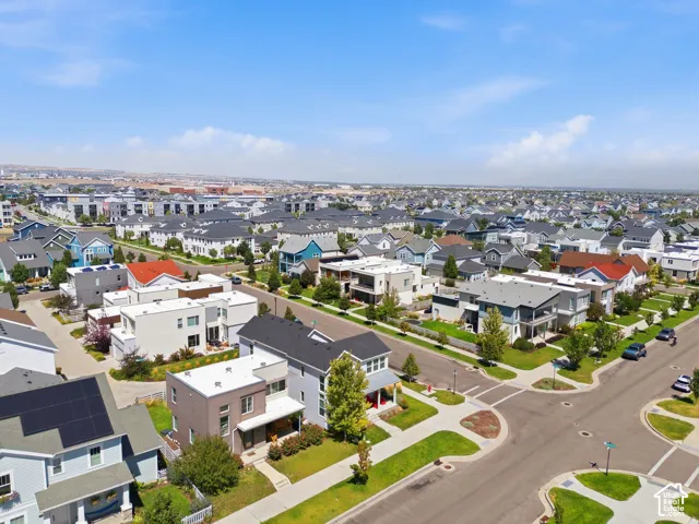 Aerial perspective of a developed residential community with varied architectural styles