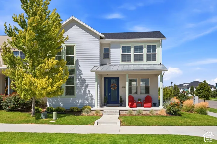 Two-story residence with porch