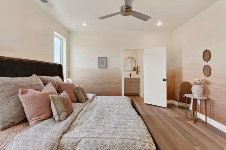 Wood-finish flooring throughout, with a single window providing natural light