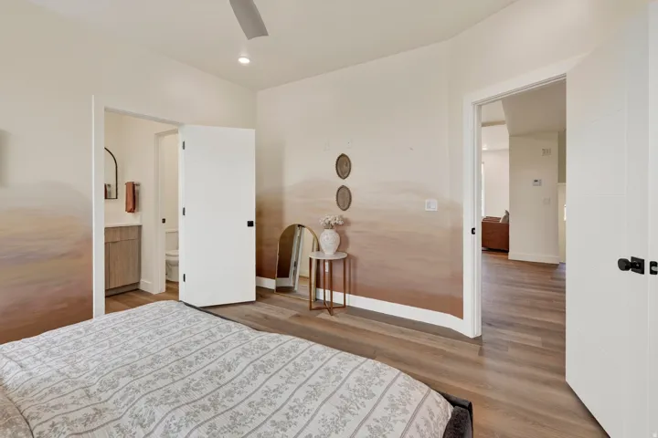 Wide plank wood-finish flooring throughout
