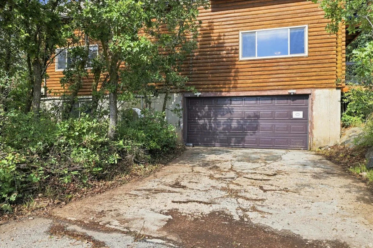 Wood-sided exterior with horizontal log-style siding