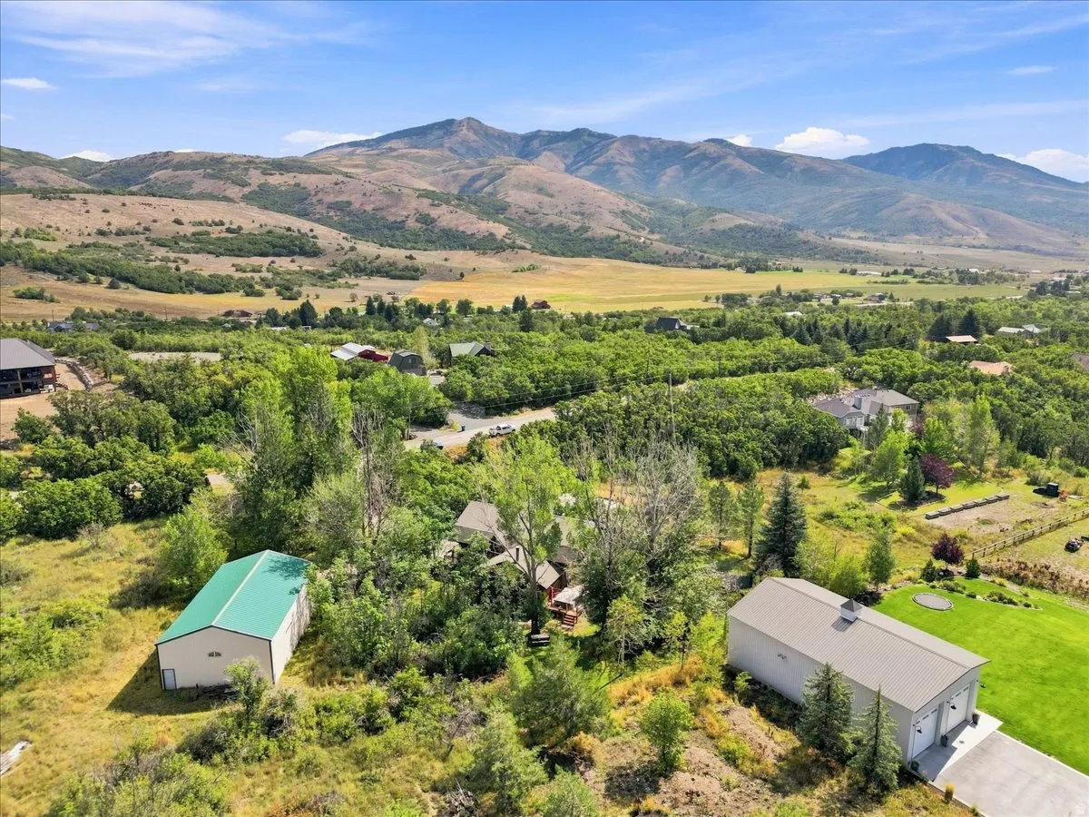 Expansive mountainous surroundings with a green valley