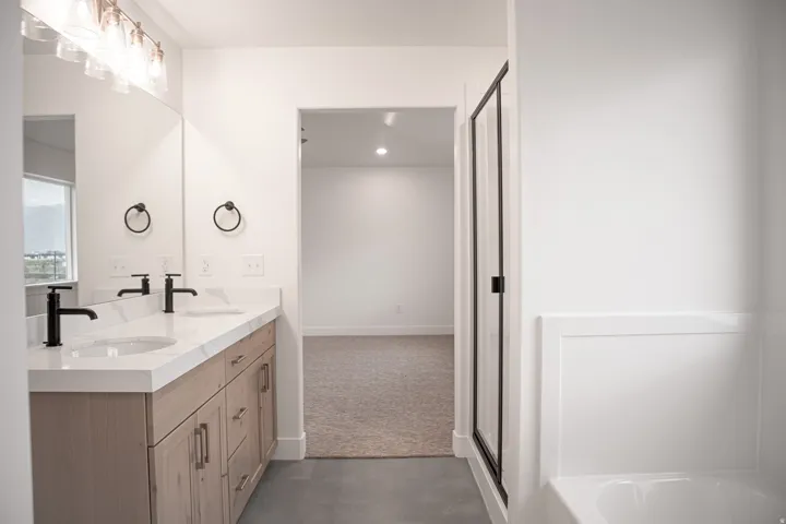 Primary bathroom featuring dual vanity