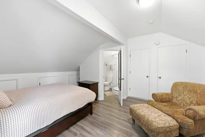 Sloped ceiling architecture with recessed storage compartments