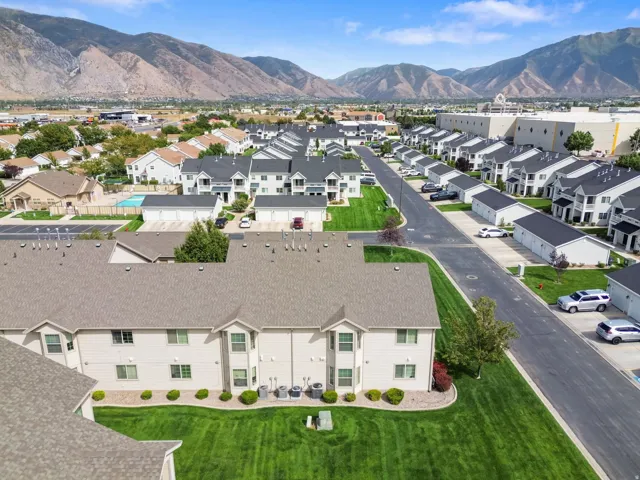 Expansive community with manicured green spaces and paved roadways