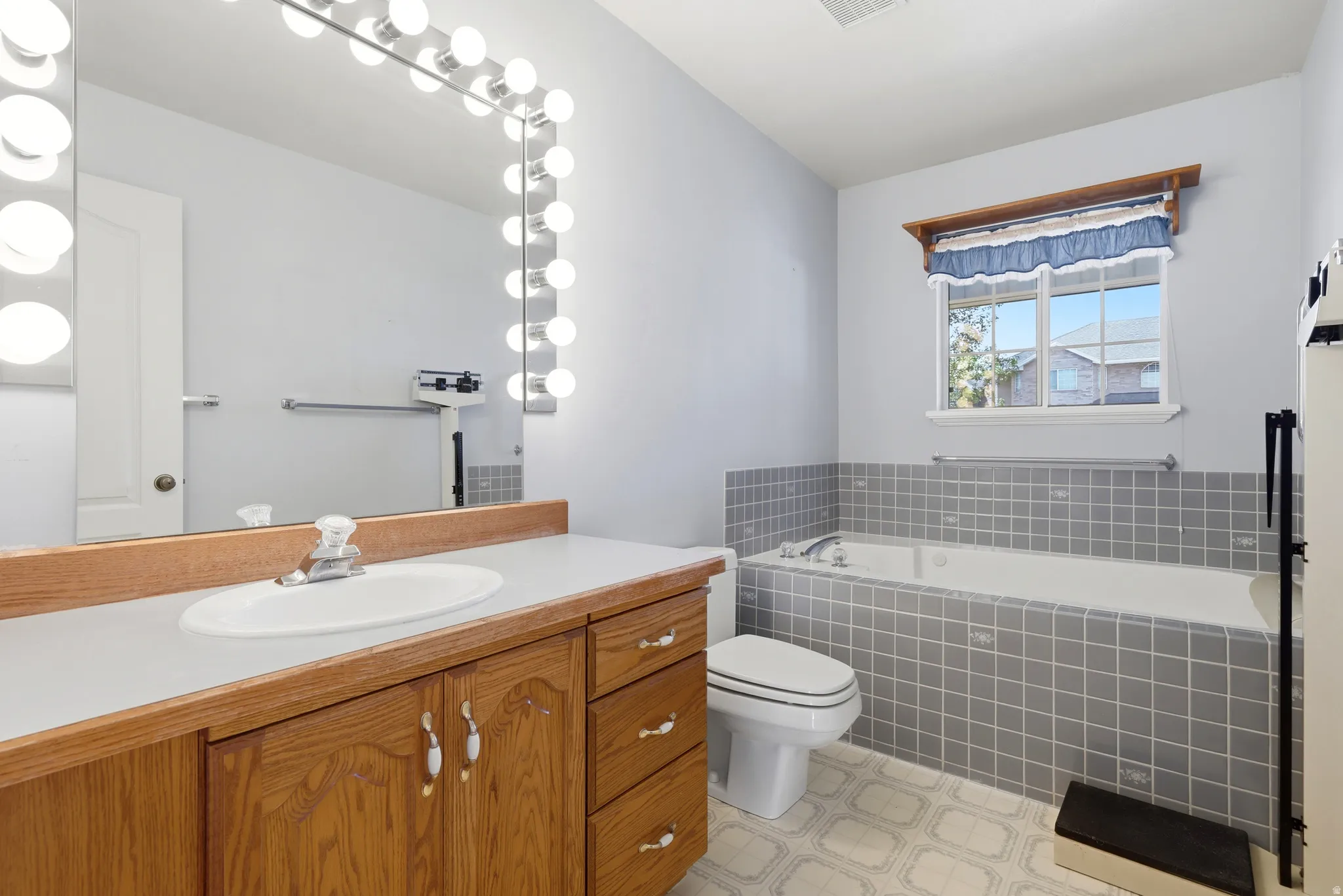 Main Floor Guest Bathroom With Jetted Tub