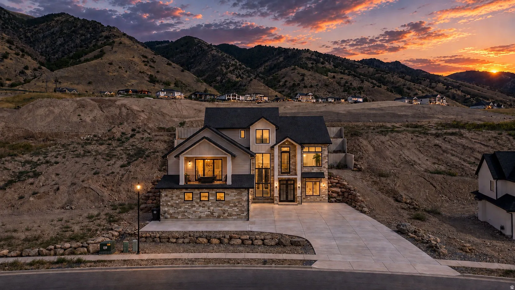 Modern exterior featuring stone and stucco finishes