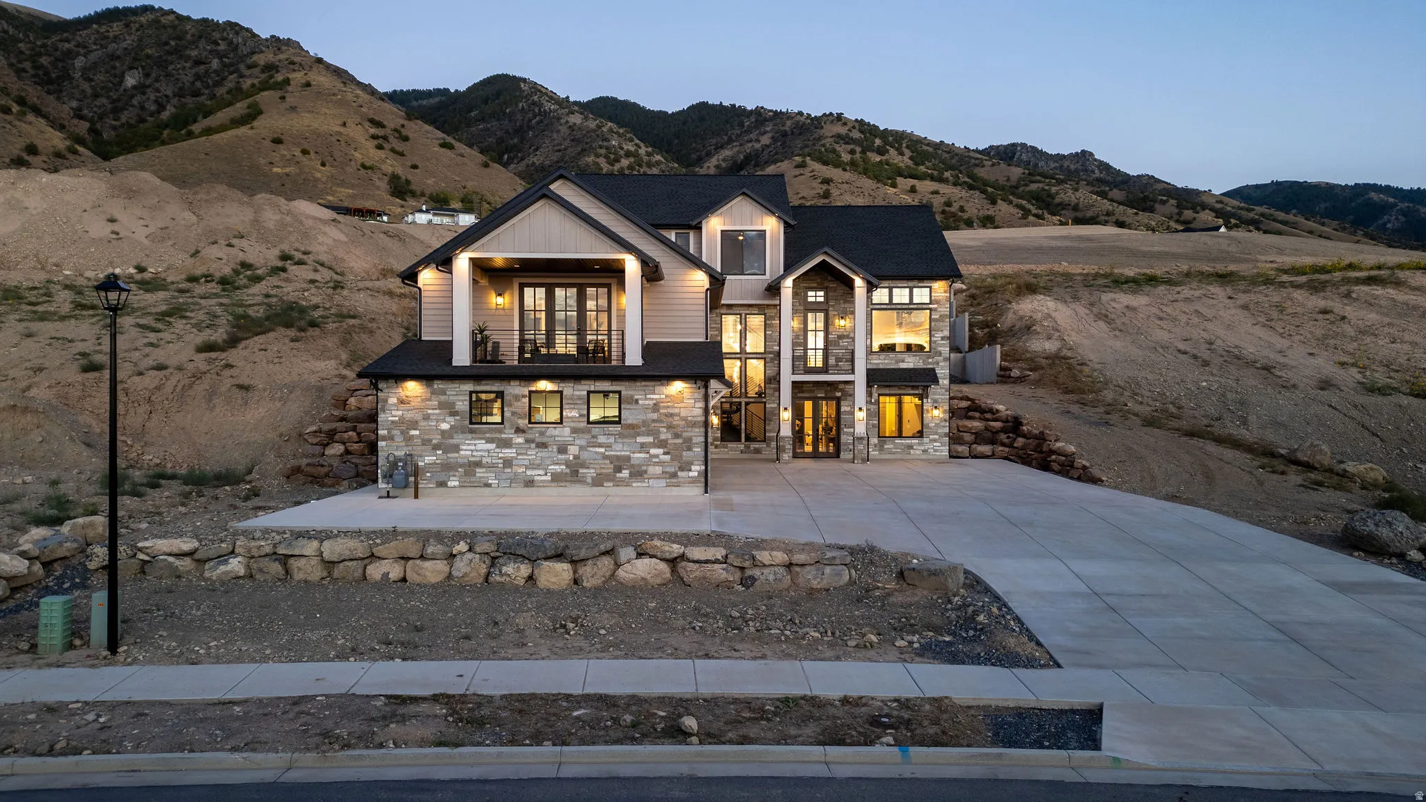 Stone and siding exterior with a multi-level design