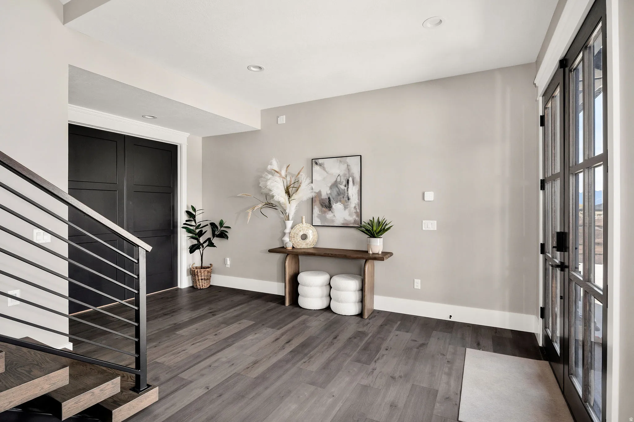 Wide plank wood-finish flooring throughout