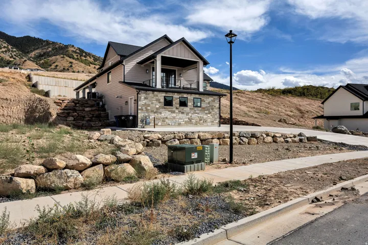 Modern construction with stone veneer and horizontal siding