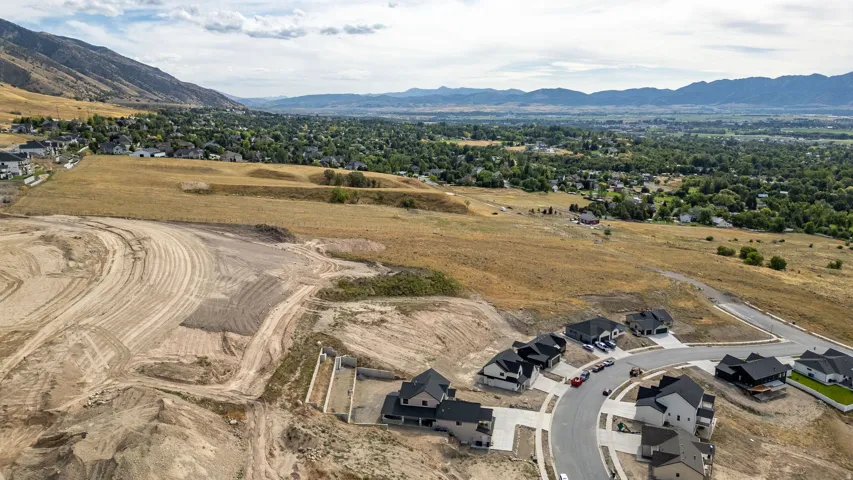 Expansive undeveloped land with visible grading