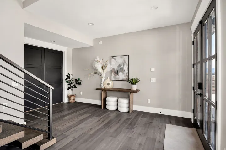 Wide plank wood-finish flooring throughout