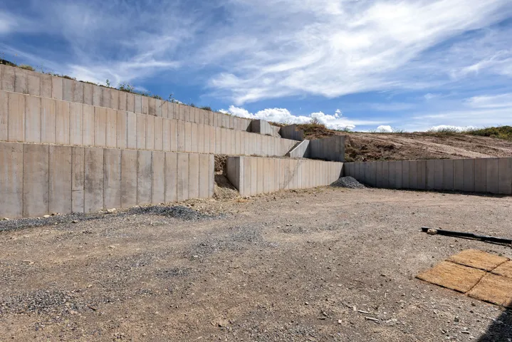Tiered concrete retaining walls