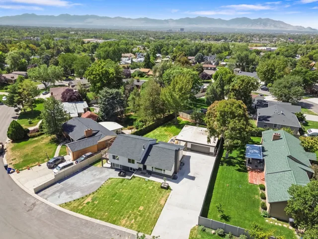 Expansive mountain backdrop with a residential setting