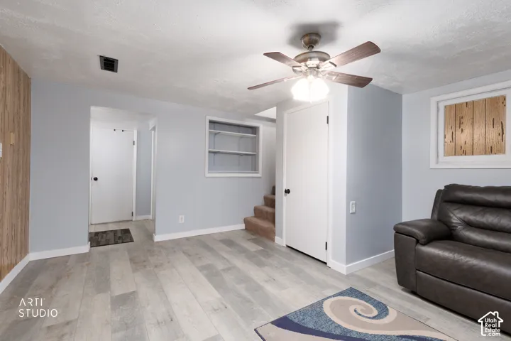 Light wood-finish flooring with light-colored walls