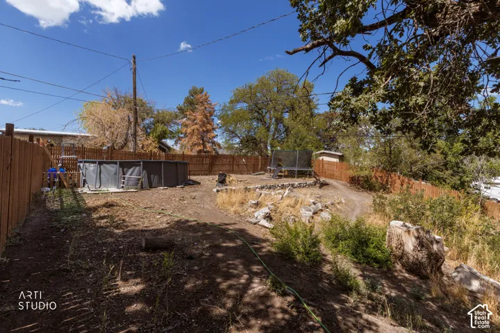 Expansive yard with mature trees