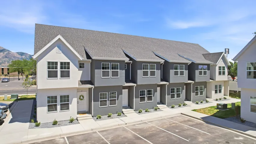 Modern townhome-style exterior with a clean architectural design