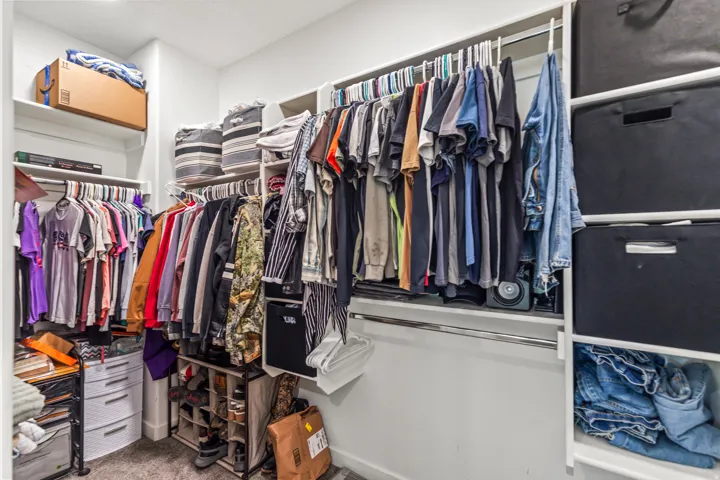 Built-in shelving with multiple hanging rods