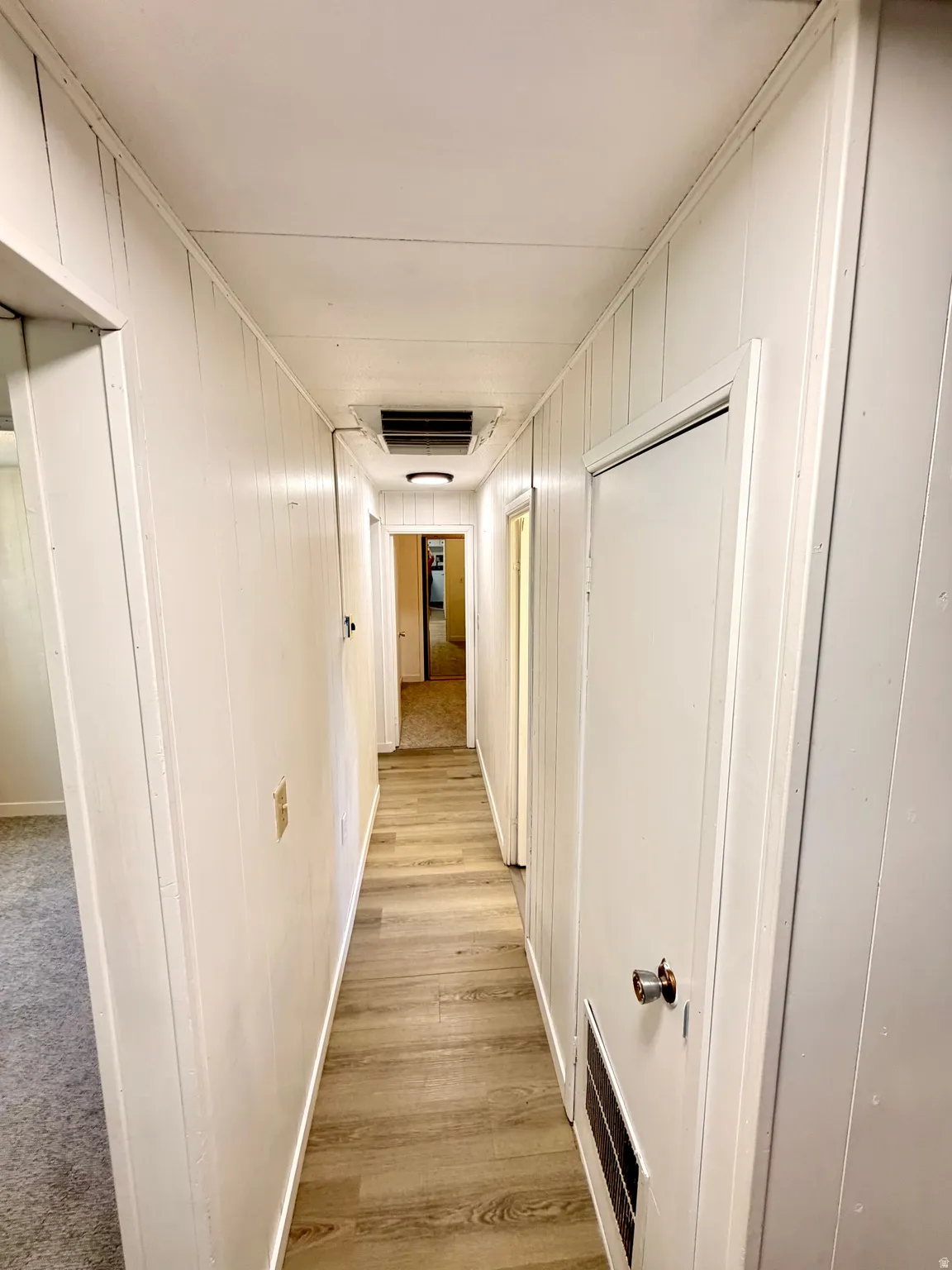 Wood-finish flooring in the hallway