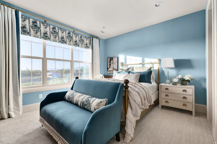 Recessed lighting, large window with expansive outdoor scenery, wall-to-wall carpeting, and a built-in closet with white doors