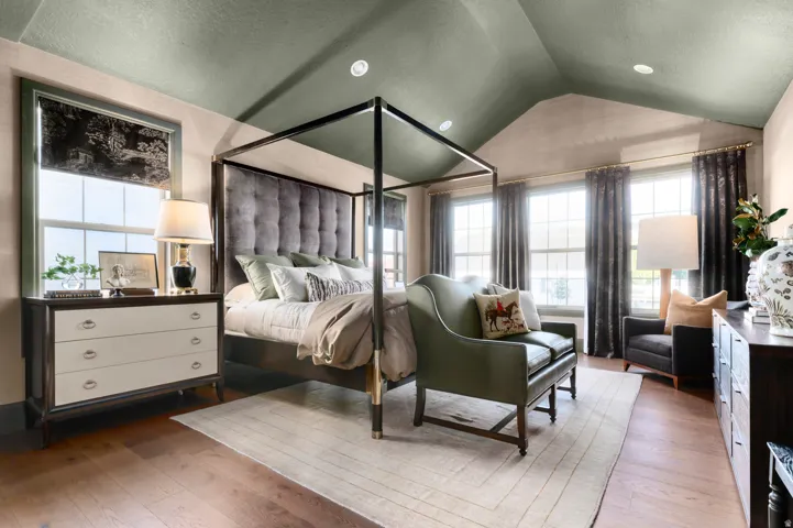 Vaulted ceiling, recessed lighting, wood-finish flooring, multiple windows, window treatments