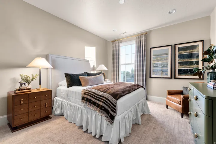 Recessed lighting, large window with natural light, light-toned wall paint, crown molding, and carpeted flooring