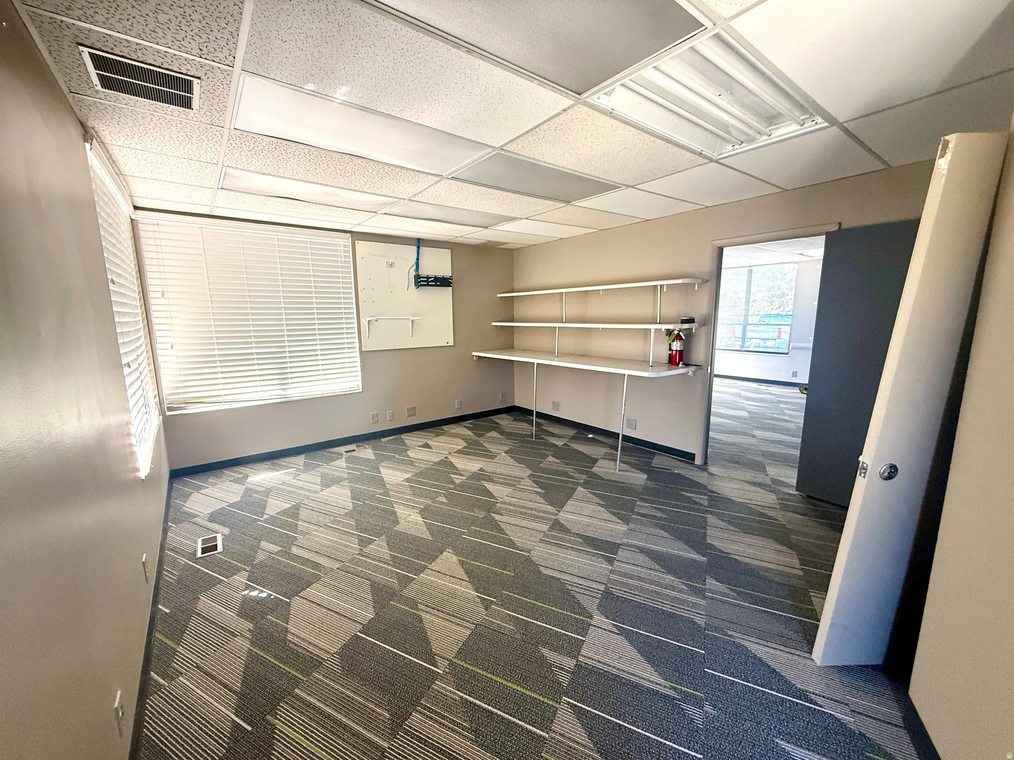 Textured carpeting in a geometric pattern