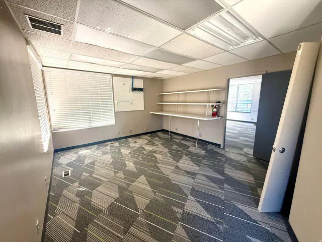 Textured carpeting in a geometric pattern