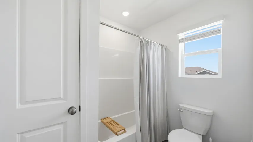 White paneled door with dark hardware