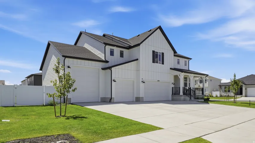 Modern farmhouse style exterior with white siding