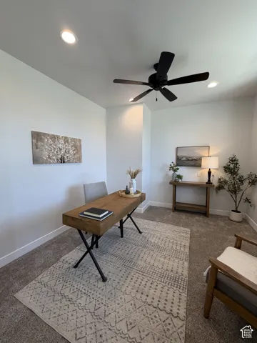 Recessed lighting, ceiling fan, and carpeted flooring
