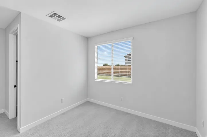 Soft gray carpeting and a white trim throughout