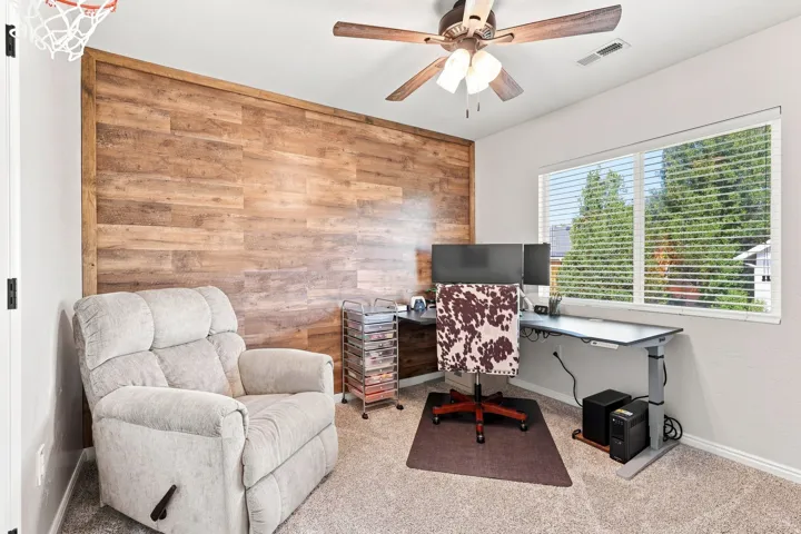 Accent wall featuring wood-finish paneling