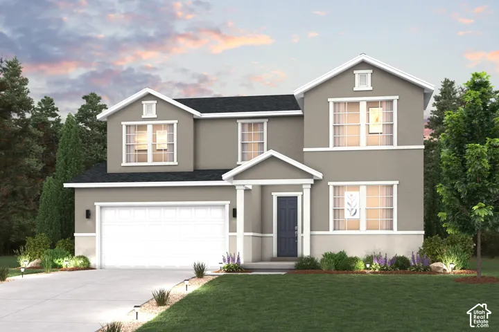 Two-story residence featuring a two-car garage, manicured lawn, and mature trees